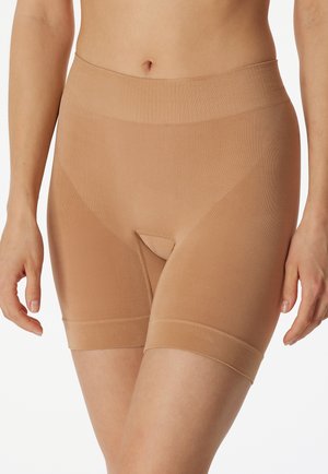 Beige boned shapewear shorts with a smooth texture, high waistband, and a mid-thigh cut. Features a cotton gusset for comfort.