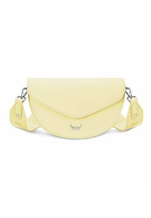 Light yellow leather crossbody bag with envelope flap, silver clasp and adjustable strap with metal clasps on white background.