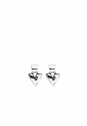 Coppia di orecchini a forma di cuore lucidi in argento, con un piccolo anello nella parte superiore per l'attacco.