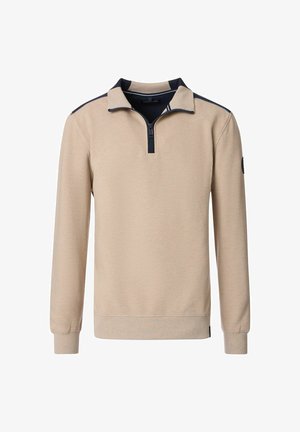 Beige pullover met een ritskraag, voorzien van marineblauwe accenten op de kraag en schouders. Geribbelde textuur, lange mouwen en aansluitende manchetten.