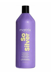 Purple plastic bottle with a tapered shape. Features large white and yellow text stating "matrix So Silver" and details about the product usage.