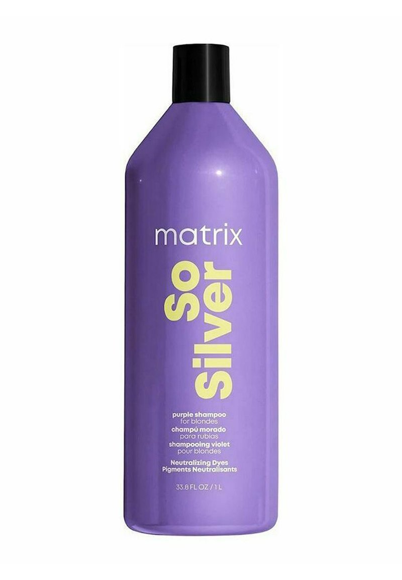 Purple plastic bottle with a tapered shape. Features large white and yellow text stating "matrix So Silver" and details about the product usage.