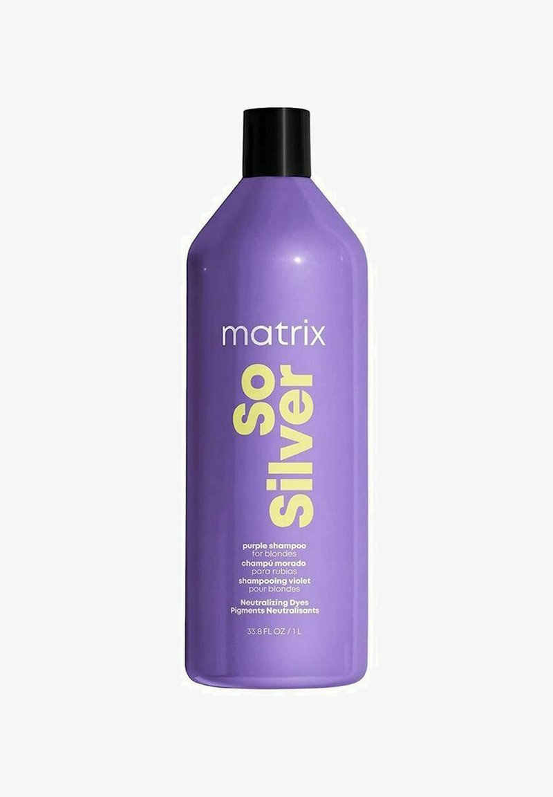 Purple plastic bottle with a tapered shape. Features large white and yellow text stating "matrix So Silver" and details about the product usage.