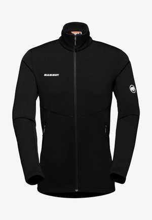 Giacca in pile nera con colletto alto, zip frontale e due tasche laterali con zip. Presenta il logo "MAMMUT" sul petto e sulla manica.