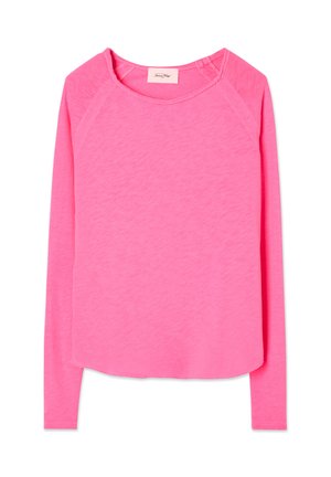 Ilgi piedurkņu tops spilgti rozā krāsā, izgatavots no mīksta auduma. Iedvesmojošs atbrīvots kakla izgriezums un noapaļots apakšmalas dizains ar izšūtiem akcentiem uz piedurknēm.