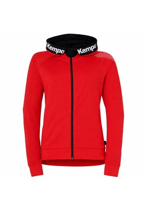 Rød hættetrøje med fuld lynlås, sort indvendig hætte med hvide "Kempa" logoer, lange ærmer og subtil teksturdetalje på højre skulder.