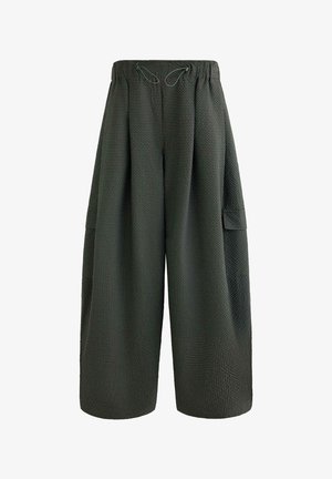 Labave tamnosive široke hlače širokih nogavica s elastičnim pojasom, vezicama i bočnim džepom s preklopom, s diskretnim kockastim uzorkom.