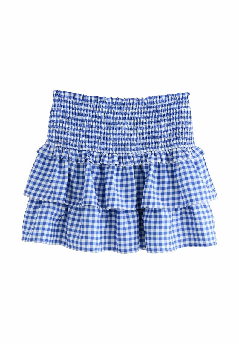 Blå och vit rutigt ruffled kjol med smockad midja och tre lager, med ett lätt tyg och en mjuk textur.