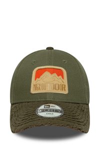Olive green cap with a brown textured brim, featuring a rectangular embroidered patch depicting mountains and the text "NEW ERA OUTDOOR."