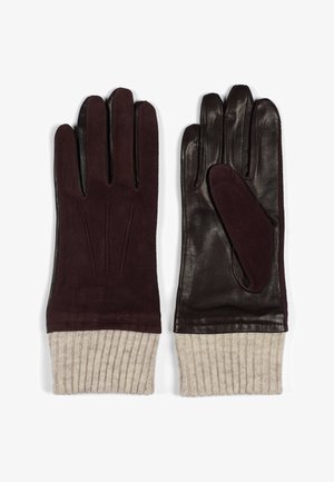 Brown leather and burgundy suede gloves feature a ribbed beige knit cuff, with detailed stitching on the suede and a smooth leather finish.