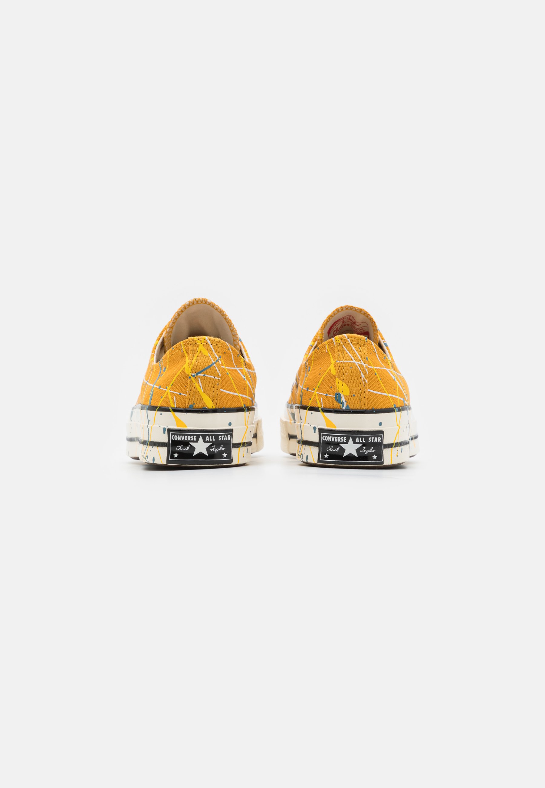 converse paint splatter low