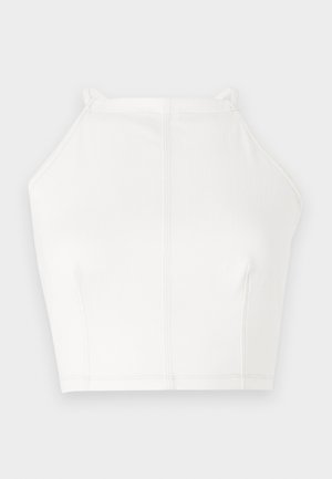 Vit cropped halterneck-topp med tunna remmar, minimal sömdekoration och en slät yta. Enkel, ren design med en något avslappnad passform.