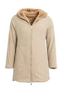 Giacca beige chiaro con chiusura a zip, dotata di cappuccio foderato in pelliccia morbida e interno in pelliccia. Include due tasche laterali e un esterno liscio e morbido.