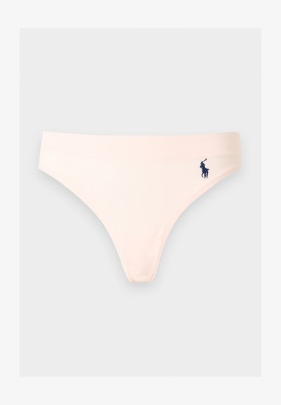 Jasnobeżowe damskie bikini z cienkim elastycznym pasem i małym granatowym haftowanym logo gracza polo na prawym boku.