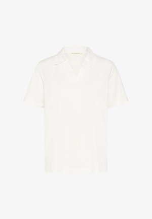 Bílá polokošile s krátkým rukávem a výstřihem do V, vyrobená z měkké látky. Má klasický límeček a uvolněný, boxy střih.