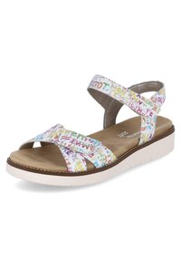 Bunte Sandalen mit Riemchen und einem weißen Synthetik-Obermaterial, das ein lustiges Muster aufweist. Weicher Fußbett und eine weiße Gummisohle mit leichtem Höhenunterschied.