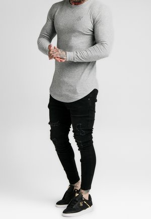 Stickad tröja - grey