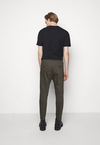 DRYKORN JEGER - Calças - mottled olive