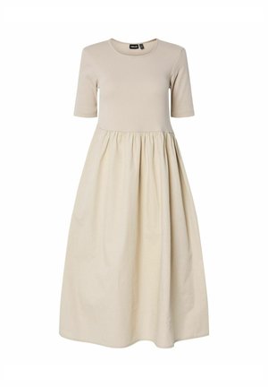 Lühikeste varrukatega kleit helesemis kangast, millel on sobiv kehaosa ja kogutud, laienev seelik. Sile tekstuur, ümar kaelus.