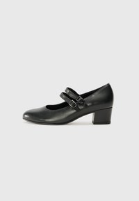 Black leather Mary Jane shoe featuring a rounded toe, two adjustable buckled straps, and a sturdy block heel. Smooth texture with a polished finish.