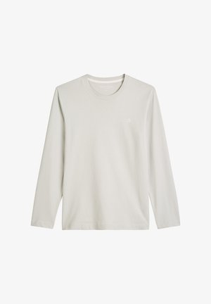 Lichtgrijze lange mouwen t-shirt van gladde katoen. Heeft een ronde halslijn en een klein, subtiel logo op de borst. Eenvoudig ontwerp.