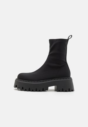 Platform ankle boots - black