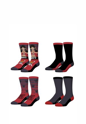 Quatre paires de chaussettes montantes en rouge et noir, deux paires arborent des motifs de crâne et un personnage portant un gilet rouge, deux paires sont de couleur unie.