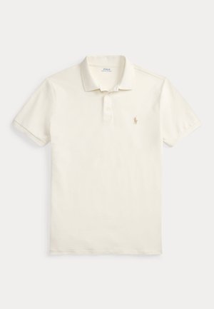 Witte polo met korte mouwen, een kraag, een knoopsluiting met drie knopen en een klein geborduurd logo op de linkerborst.