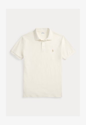 Witte polo met korte mouwen, een kraag, een knoopsluiting met drie knopen en een klein geborduurd logo op de linkerborst.