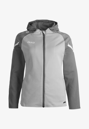 Giacca zip-up grigia chiara con cappuccio, dotata di maniche grigie scure, dettagli testurizzati sulle spalle e nome del marchio "JAKO" stampato sul petto.