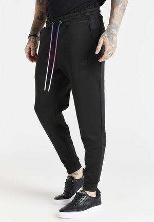 EXPOSE FADE - Pantaloni sportivi - black