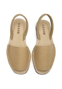 Vegan brown sandals with a flat sole, rounded toe, and two narrow straps. Features stitched detailing and embossed brand name on the insole.