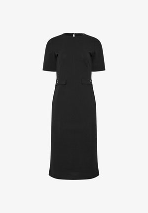 Zwarte knie-lange jurk met korte mouwen, ronde halslijn en twee decoratieve klepjes met knopen ter hoogte van de taille.