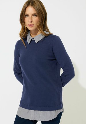 - Sweter