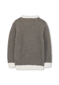 Pull en tricot noir et crème, avec un motif texturé, des manches longues, et un col rond et un ourlet côtelés.
