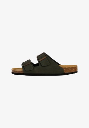 Sandale à enfiler vert foncé avec deux boucles ajustables et une semelle en liège, vue de profil sur fond blanc.