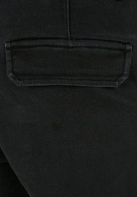 Urban Classics KNITTED CARGO JOGGING PANTS - Cargo trousers - black