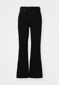 Jeans acampanados negros de cintura alta con costuras visibles en la parte frontal y diseño clásico de cinco bolsillos.