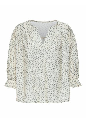 Chemisier blanc avec un petit motif floral bleu, décolleté en V et manches ballons froncées. Fabriqué en tissu léger avec une texture douce.