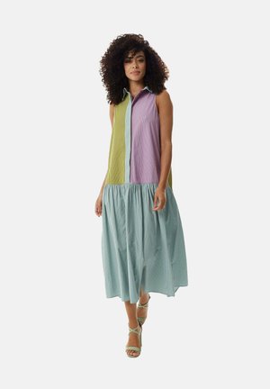 Sleeveless dress with a color-block design in purple, green, and blue striped fabric, featuring a flared hem and button collar.