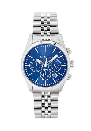 Sølv rustfrit stål kronograf ur med en blå urskive, tre små sub-dials, datovisning og et sammenkoblet metalarmbånd.