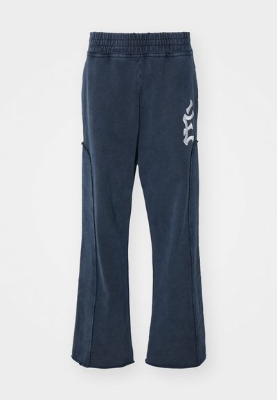 Études PANT EMBROIDERED - Tracksuit bottoms - navy