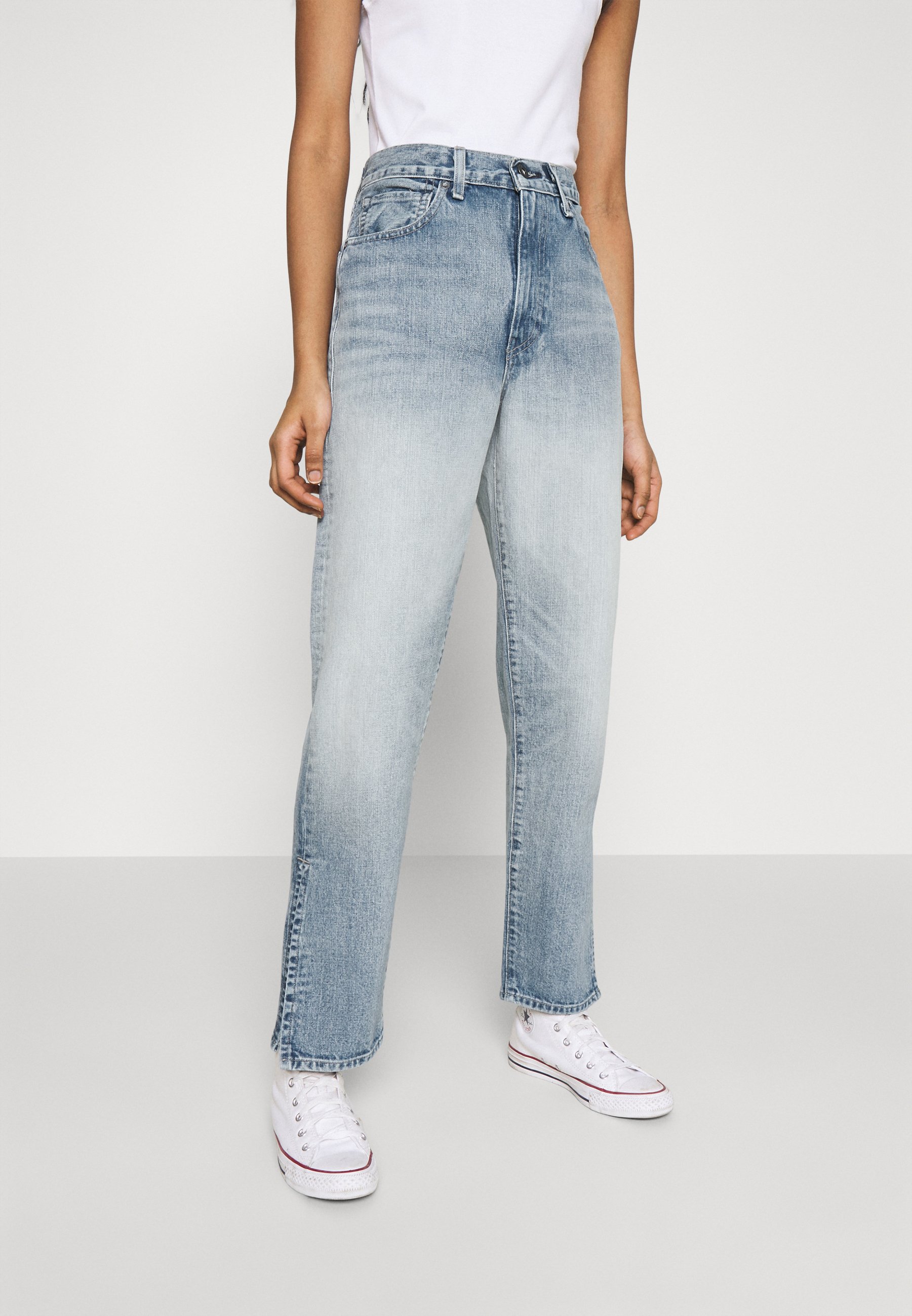 levi's column jeans white