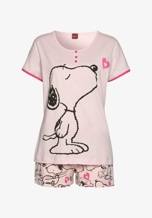 Pink cotton pajamas featuring a Snoopy print on the top and a pattern of Snoopy illustrations with hearts on the shorts. Pink accents at the neckline.