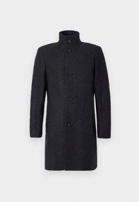 Manteau en laine gris foncé pour homme avec col montant et cinq boutons noirs, présenté sur un fond clair et uni.