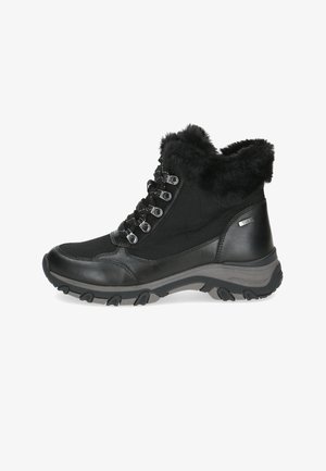 Bottes noires imperméables avec col en fourrure synthétique, tissu texturé et dessus en cuir, œillets en métal et semelle en caoutchouc robuste pour une meilleure traction.