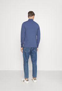 Tommy Hilfiger Polo - faded indigo