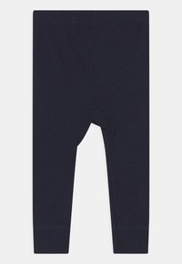 Leggings bleu marine en tissu extensible et texturé. Dotés d'une taille élastique et de poignets ourlés, adaptés pour un usage décontracté.