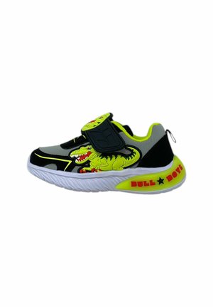 Sneaker per bambini con tomaia in tessuto nero e grigio, dettagli in verde neon, grafica di un dinosauro, strap in Velcro e suola in gomma bianca.