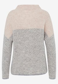 Pull tricot bicolore avec haut beige et motif chevron gris sur les manches et le bas, vu de dos.